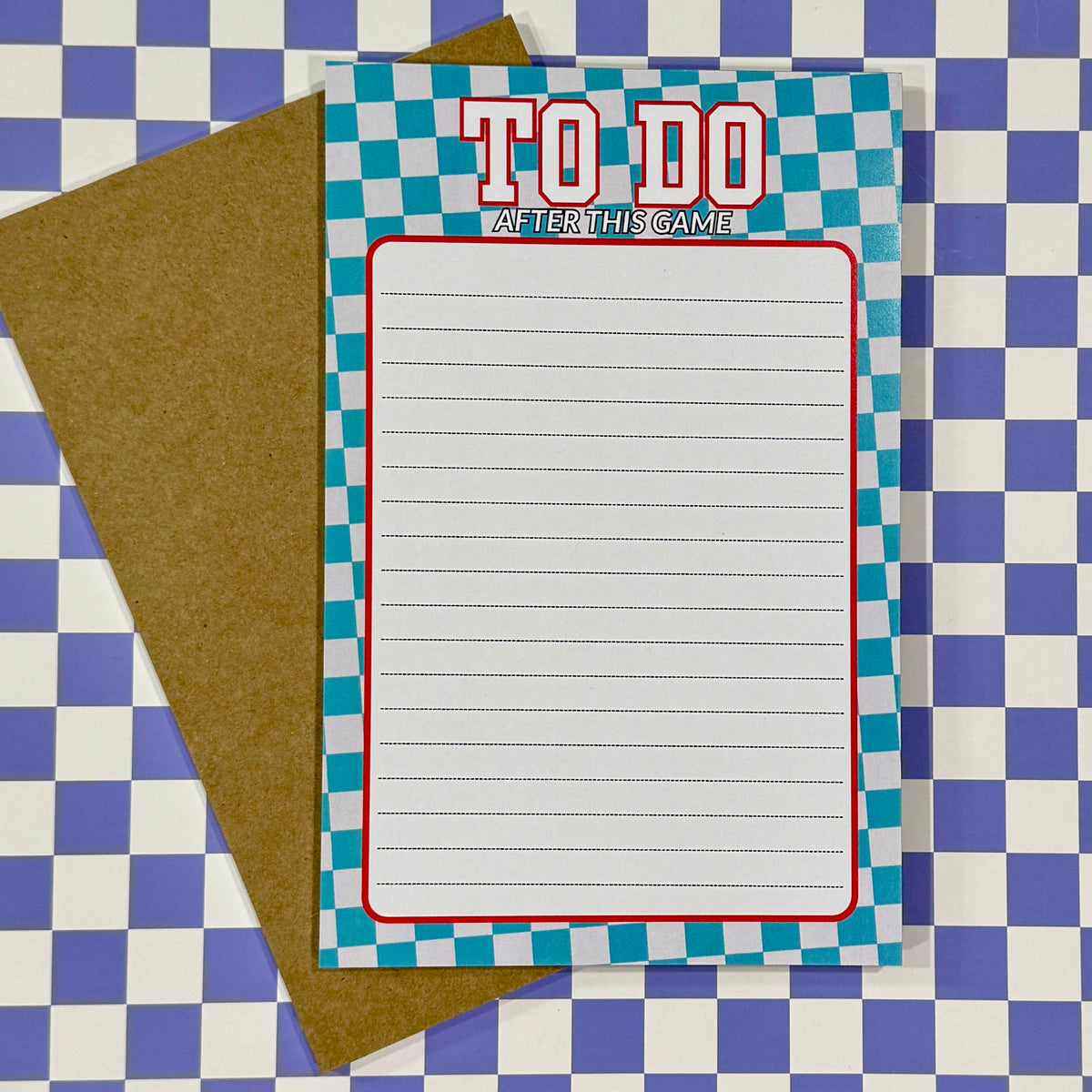 Notebook with 'To Do' list on a checkered background